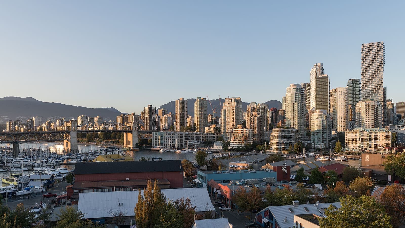 Granville Island, False Creek and the Burrard Street Bridge below downtown Vancouver towers, British Columbia