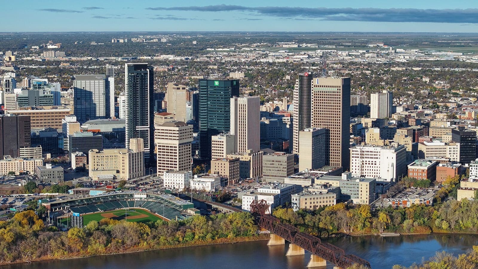 Aerial view of downtown Winnipeg towers and the Red River in autumn, Manitoba